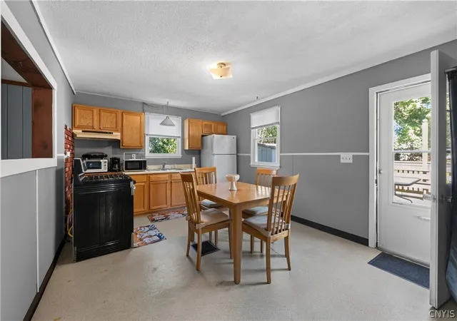 Photo 4 of Single family home for sale at 313 Chestnut St, Oswego, NY 13126 | MLS# S1712981 | Listing updated on 2026-09-08