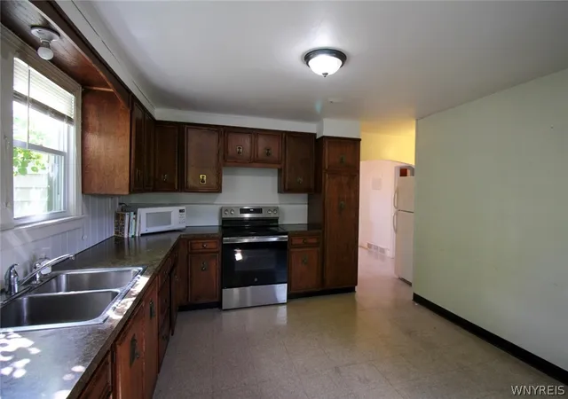 Photo 3 of Single family home for sale at 4801 N Bailey Ave, Buffalo, NY 14226 | MLS# B1713510 | Listing updated on 2026-09-11