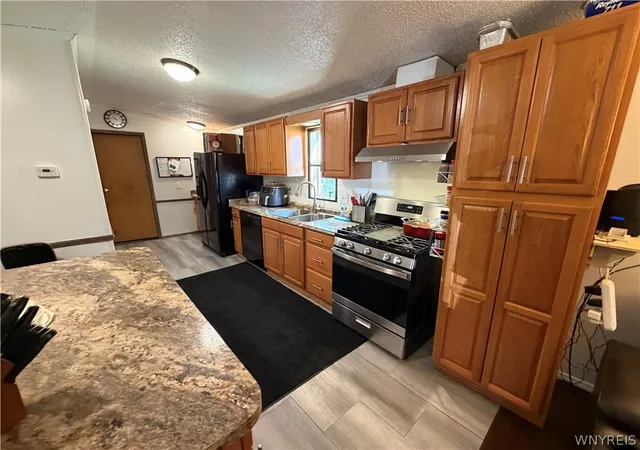 Photo 2 of Single family home for sale at 58 W Canyon Dr, Hamburg, NY 14075 | MLS# B1713939 | Listing updated on 2026-09-12