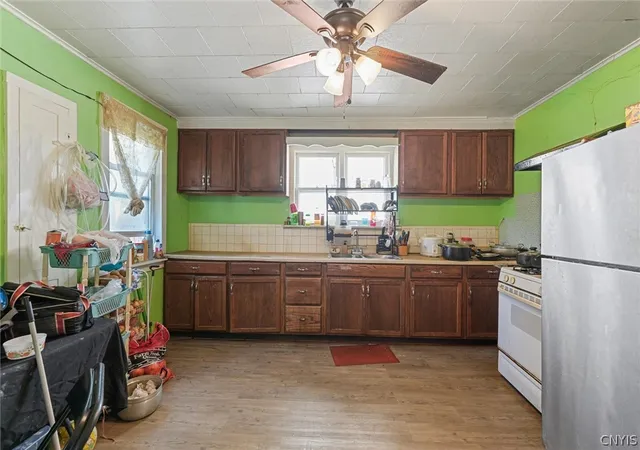 Photo 3 of Multi family home for sale at 1317 Butternut St, Syracuse, NY 13208 | MLS# S1714295 | Listing updated on 2026-09-15