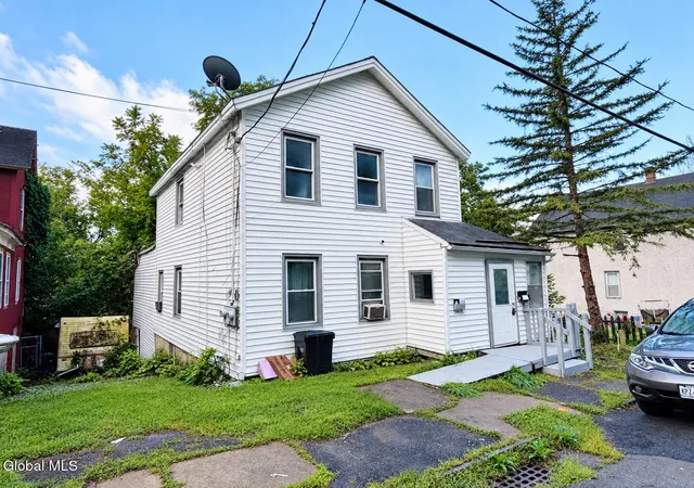 Photo 1 of Multi family home for sale at 97 Grove St, Amsterdam, NY 12010 | MLS# 202625262 | Listing updated on 2026-09-10