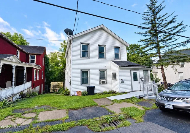 Photo 2 of Multi family home for sale at 97 Grove St, Amsterdam, NY 12010 | MLS# 202625262 | Listing updated on 2026-09-10
