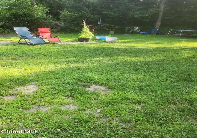 Photo 2 of Multi family home for sale at 57 Wells St, Gloversville, NY 12078 | MLS# 202625209 | Listing updated on 2026-09-04