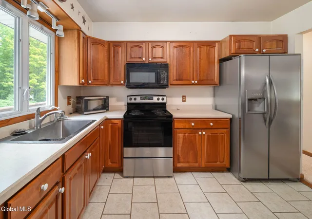 Photo 2 of Single family home for sale at 242 Burdick Rd, Gloversville, NY 12078 | MLS# 202625501 | Listing updated on 2026-10-05