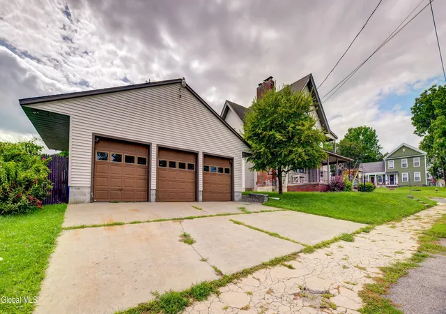 Photo 3 of Multi family home for sale at 95 West St, Gloversville, NY 12078 | MLS# 202625655 | Listing updated on 2026-09-10
