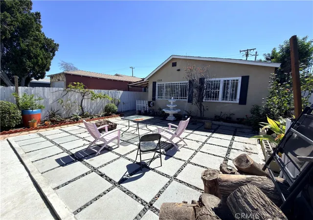 Photo 3 of Sale Pending at 1318 E 100th Street, Los Angeles, CA 90002 | MLS# OC26030159 | Listing updated on 2026-09-14