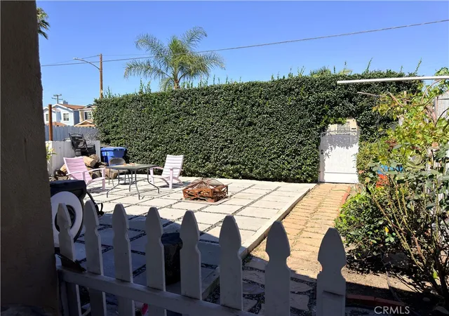 Photo 3 of Sale Pending at 1318 E 100th Street, Los Angeles, CA 90002 | MLS# OC26030159 | Listing updated on 2026-09-14