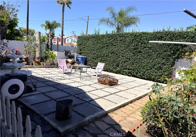 Photo 4 of Sale Pending at 1318 E 100th Street, Los Angeles, CA 90002 | MLS# OC26030159 | Listing updated on 2026-09-14