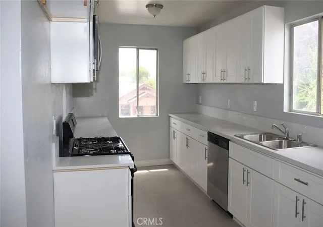 Photo 2 of Multi family home for sale at 1009 E Stockton Ave, Compton, CA 90221 | MLS# OC26064278 | Listing updated on 2026-09-14