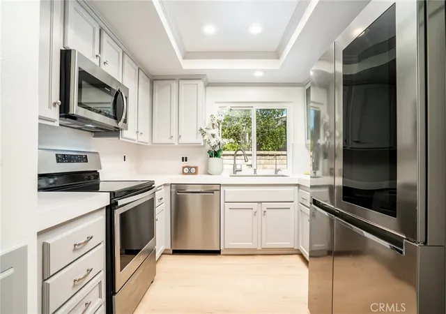 Listing Photo 4 - Condo for sale in building located at 8777 Coral Springs Ct, Huntington Beach, CA 92646 - Unit #11B