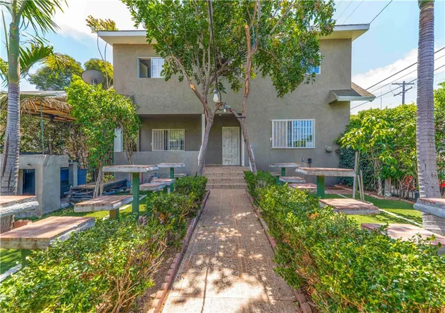 Photo 2 of Multi family home for sale at 736 W 41st Place, Los Angeles, CA 90037 | MLS# DW26081633 | Listing updated on 2026-09-15