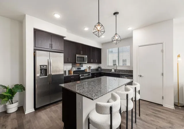 Listing Photo 1 - Condo for sale in building located at 5412 Calle Sandwaves, San Diego, CA 92154 - Unit #169