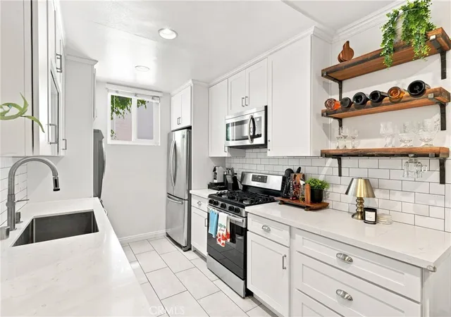 Photo 3 of Condo for sale at 1827 Greenfield Ave #105, Los Angeles, CA 90025 | MLS# SB26175053 | Listing updated on 2026-10-05