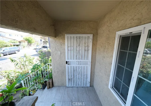 Photo 3 of Single family home for sale at 953 S Hollins St, Los Angeles, CA 90023 | MLS# DW26175871 | Listing updated on 2026-09-15