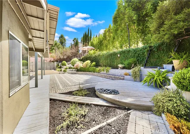 Photo 3 of Single family home for sale at 22921 Cass Ave, Woodland Hills, CA 91364 | MLS# SR26177827 | Listing updated on 2026-09-15