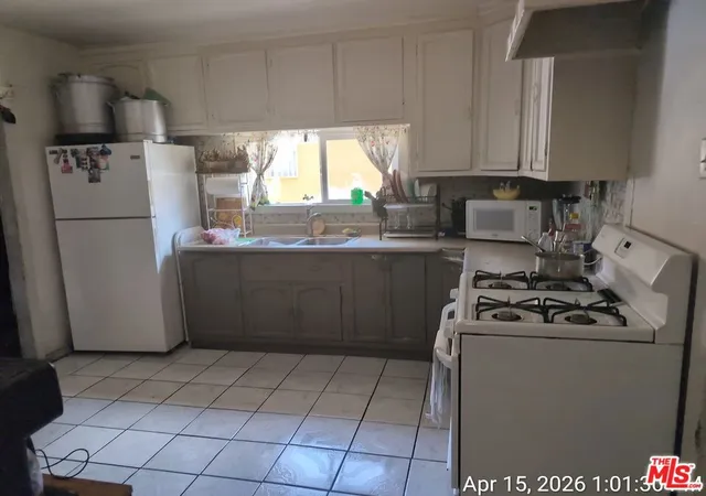 Photo 3 of Multi family home for sale at 1654 E 32nd Street, Los Angeles, CA 90011 | MLS# 26985595 | Listing updated on 2026-09-16