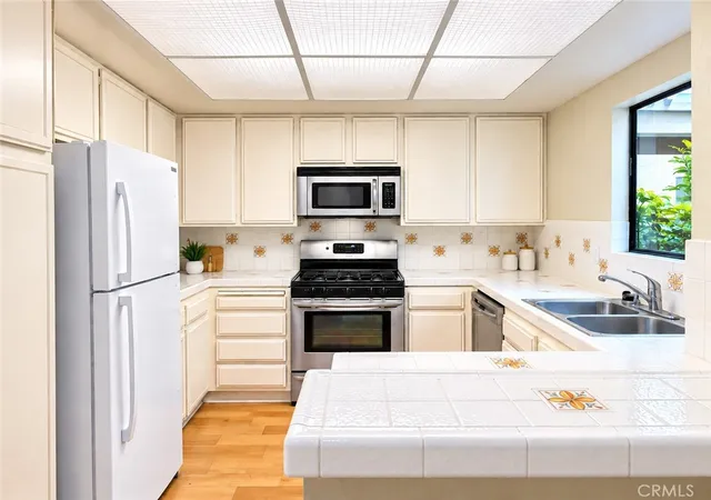 Photo 1 of Condo for sale at 16581 Grunion Ln #105, Huntington Beach, CA 92649 | MLS# SW26200422 | Listing updated on 2026-09-16