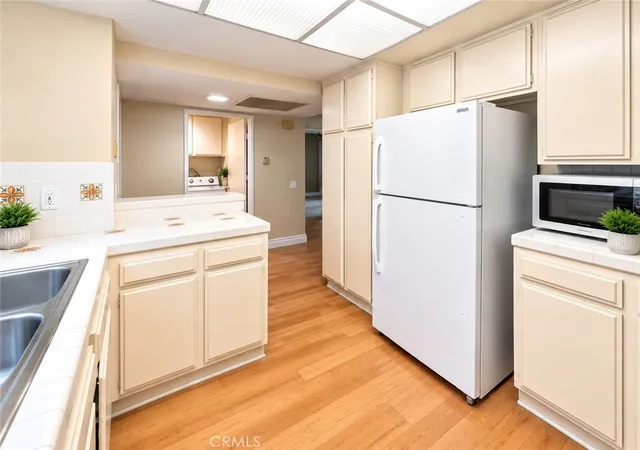 Photo 2 of Condo for sale at 16581 Grunion Ln #105, Huntington Beach, CA 92649 | MLS# SW26200422 | Listing updated on 2026-09-16