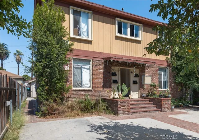 Photo 1 of Multi family home for sale at 915 E 23rd Street, Los Angeles, CA 90011 | MLS# DW26200437 | Listing updated on 2026-09-14