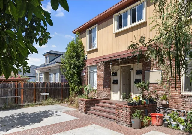 Photo 2 of Multi family home for sale at 915 E 23rd Street, Los Angeles, CA 90011 | MLS# DW26200437 | Listing updated on 2026-09-14