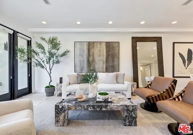 Photo 1 of Condo for sale at 11715 Chenault St #102, Los Angeles, CA 90049 | MLS# 26988341 | Listing updated on 2026-09-23