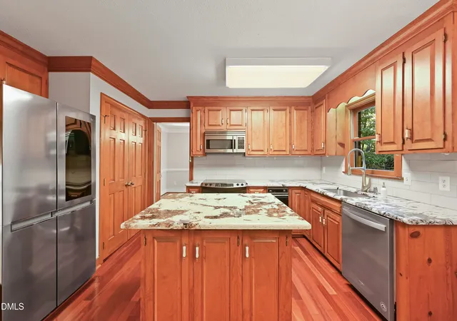 Photo 4 of Single family home for sale at 1011 Queensferry Rd, Cary, NC 27511 | MLS# 10199860 | Listing updated on 2026-10-26