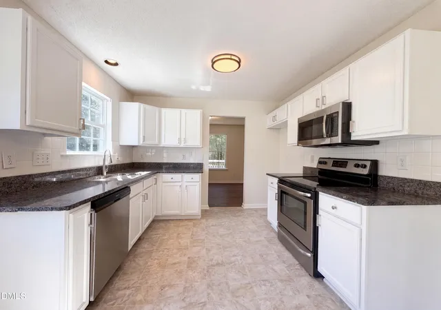Photo 2 of Single family home for sale at 301 Hocutt Dr, Clayton, NC 27520 | MLS# 10162957 | Listing updated on 2026-10-01