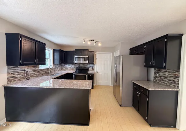 Photo 2 of Single family home for sale at 128 Morena Dr, Holly Springs, NC 27540 | MLS# 10174078 | Listing updated on 2026-10-08