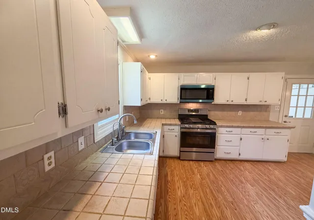 Photo 2 of Single family home for sale at 102 Carmel Ct, Cary, NC 27511 | MLS# 10175699 | Listing updated on 2026-09-20