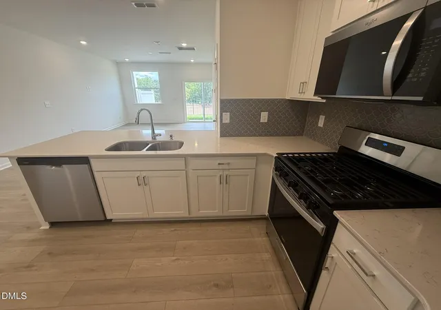 Photo 2 of Townhouse for sale at 2109 Oakdale Dr, Durham, NC 27703 | MLS# 10184412 | Listing updated on 2026-09-18