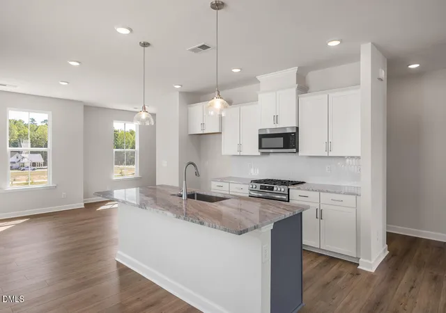 Photo 1 of Townhouse for sale at 401 Bahia Dr, Knightdale, NC 27545 | MLS# 10185381 | Listing updated on 2026-09-21