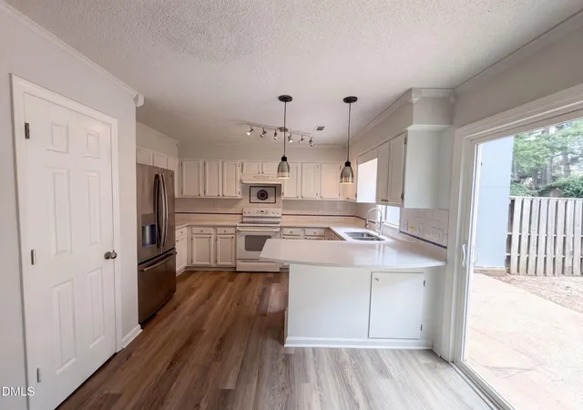 Photo 1 of Townhouse for sale at 4305 Kaplan Dr, Raleigh, NC 27606 | MLS# 10186560 | Listing updated on 2026-09-15