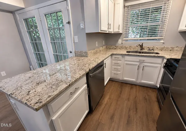 Photo 2 of Townhouse for sale at 4808 Blue Bird Ct #D, Raleigh, NC 27606 | MLS# 10188376 | Listing updated on 2026-09-10