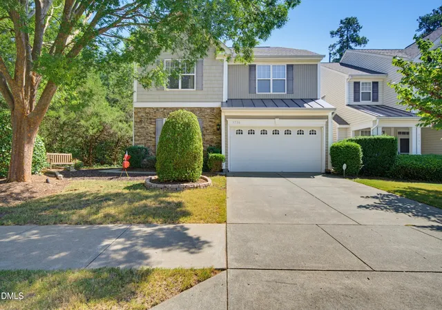 Photo 1 of Townhouse for sale at 9736 Renfield Dr, Raleigh, NC 27617 | MLS# 10190782 | Listing updated on 2026-09-04