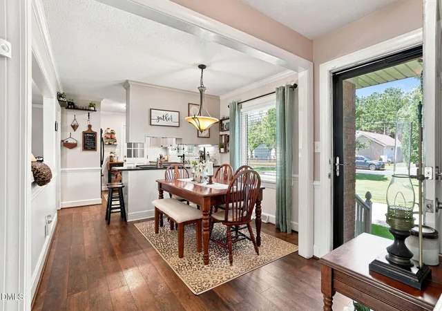Photo 2 of Single family home for sale at 1100 Par 3 Dr S, Wilson, NC 27893 | MLS# 10190382 | Listing updated on 2026-09-13