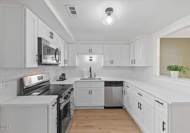 Photo 3 of Townhouse for sale at 12 Patriot Cir, Durham, NC 27704 | MLS# 10190570 | Listing updated on 2026-09-27