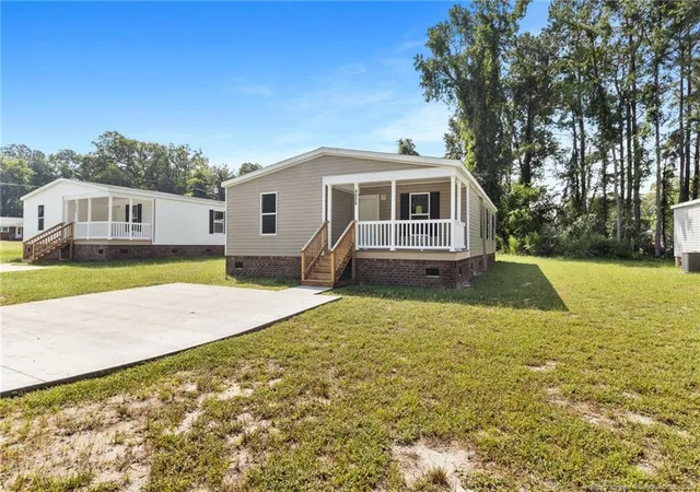 Photo 2 of Manufactured home for sale at 4056 Lodge Dr, Wade, NC 28395 | MLS# 768549 | Listing updated on 2026-09-09
