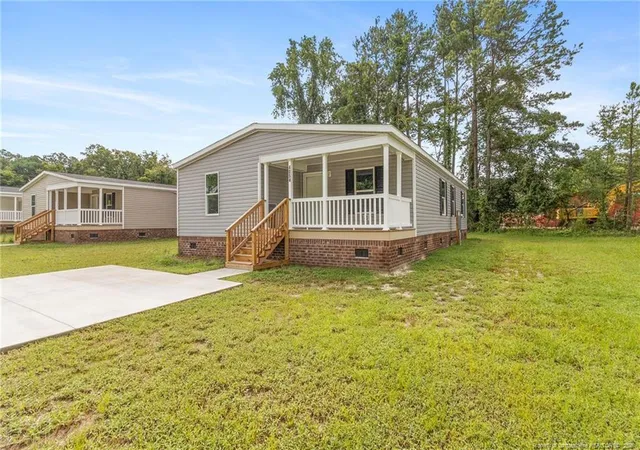 Photo 2 of Manufactured home for sale at 4054 Lodge Dr, Wade, NC 28395 | MLS# 768548 | Listing updated on 2026-09-09