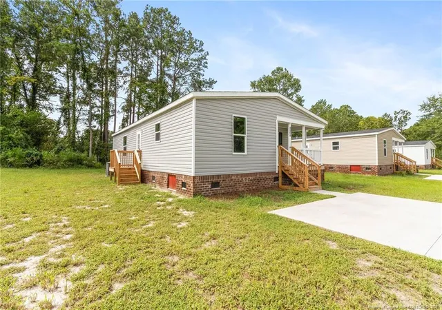 Photo 3 of Manufactured home for sale at 4054 Lodge Dr, Wade, NC 28395 | MLS# 768548 | Listing updated on 2026-09-09