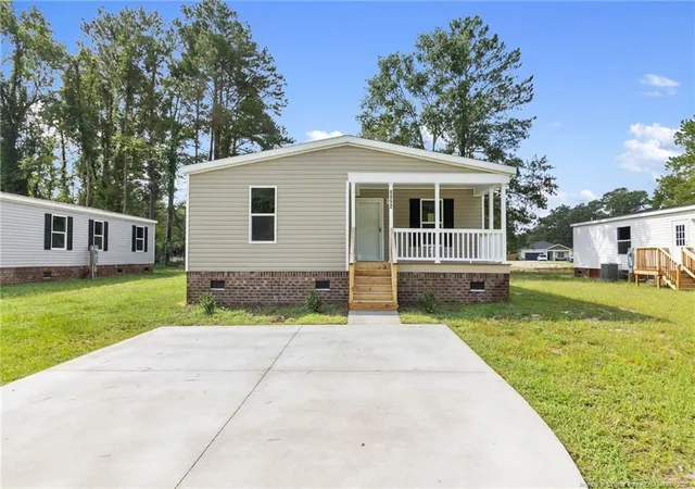 Photo 2 of Manufactured home for sale at 4052 Lodge Dr, Wade, NC 28395 | MLS# 768547 | Listing updated on 2026-09-09