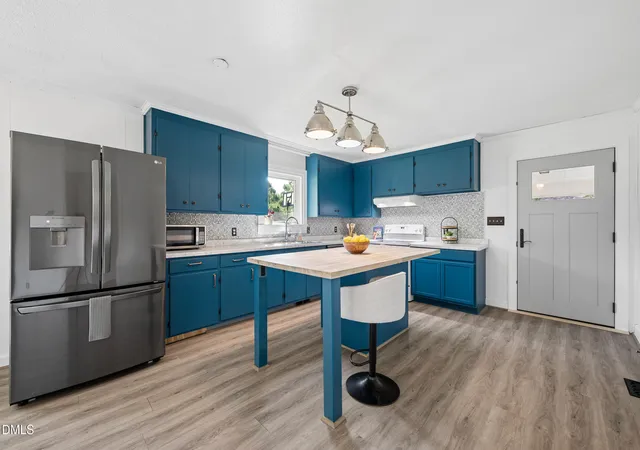Photo 4 of Single family home for sale at 402 Stallings Rd, Zebulon, NC 27597 | MLS# 10190394 | Listing updated on 2026-10-11