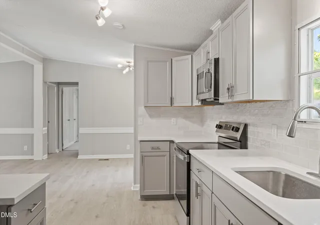 Photo 3 of Manufactured home for sale at 2314 Basil Holt Rd, Burlington, NC 27217 | MLS# 10191001 | Listing updated on 2026-09-07