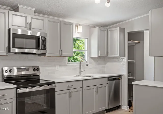 Photo 4 of Manufactured home for sale at 2314 Basil Holt Rd, Burlington, NC 27217 | MLS# 10191001 | Listing updated on 2026-09-07