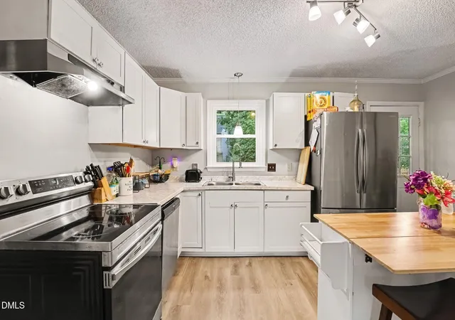 Photo 2 of Single family home for sale at 7320 Ewing Pl, Raleigh, NC 27616 | MLS# 10190379 | Listing updated on 2026-09-24