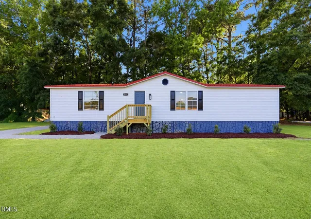 Photo 1 of Manufactured home for sale at 211 Duck Ridge Dr, Pikeville, NC 27863 | MLS# 10191327 | Listing updated on 2026-09-08