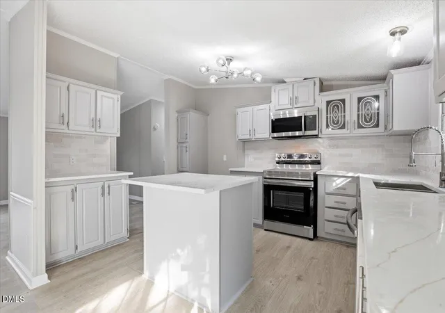 Photo 2 of Manufactured home for sale at 211 Duck Ridge Dr, Pikeville, NC 27863 | MLS# 10191327 | Listing updated on 2026-09-08