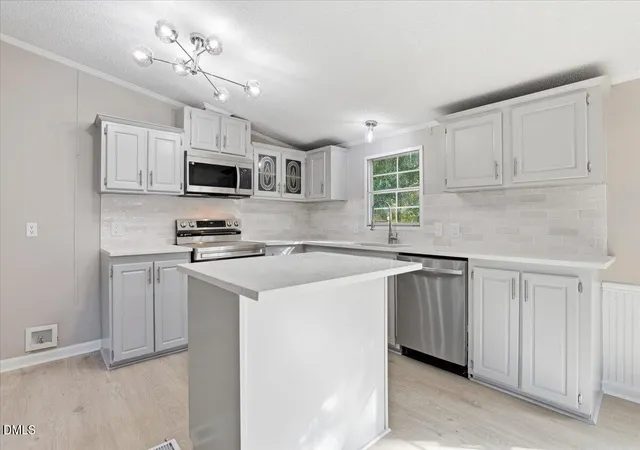 Photo 3 of Manufactured home for sale at 211 Duck Ridge Dr, Pikeville, NC 27863 | MLS# 10191327 | Listing updated on 2026-09-08