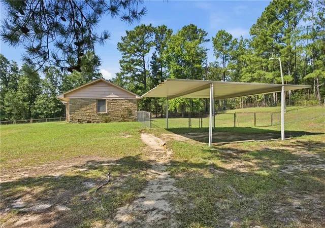 Photo 2 of Single family home for sale at 8220 Nc 210 S, Bunnlevel, NC 28323 | MLS# 768799 | Listing updated on 2026-09-19