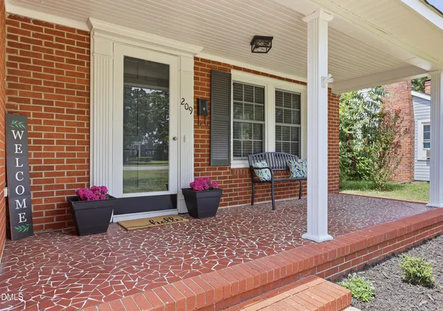 Photo 3 of Single family home for sale at 209 N Watauga Ave, Dunn, NC 28334 | MLS# 10190299 | Listing updated on 2026-09-11