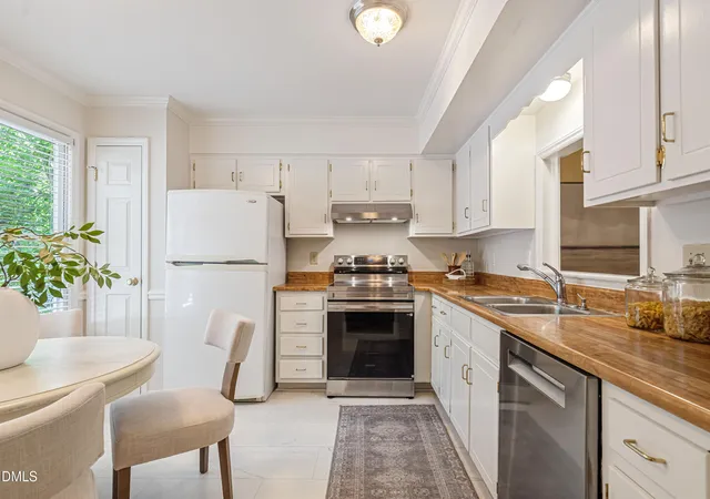 Photo 2 of Townhouse for sale at 1523 Woodcroft Dr, Raleigh, NC 27609 | MLS# 10192088 | Listing updated on 2026-09-14